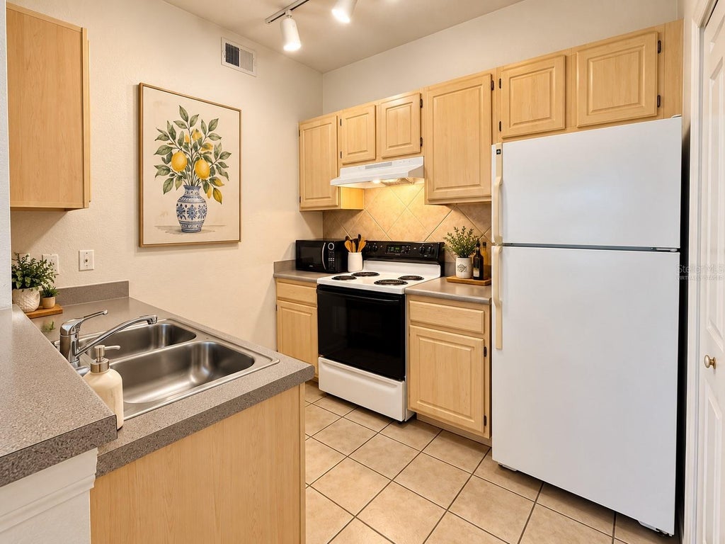 Photo of 8929 Legacy Court #108, Kissimmee, FL 34747 (MLS # O6452057)
