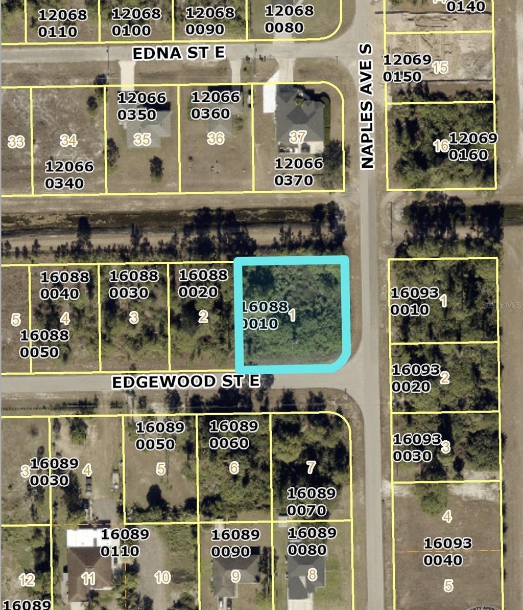 Photo of 1257 Edgewood Street E, Lehigh Acres, FL 33974 (MLS # R4912219)