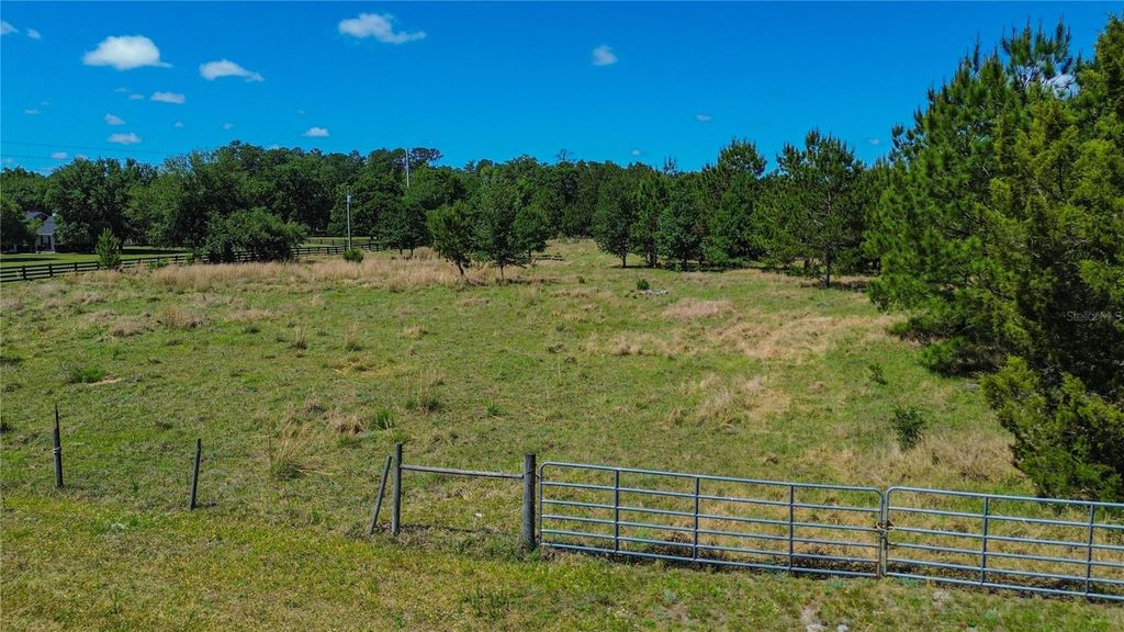 Photo of 6489 Quarterhorse Lane, Brooksville, FL 34604 (MLS # TB8504977)