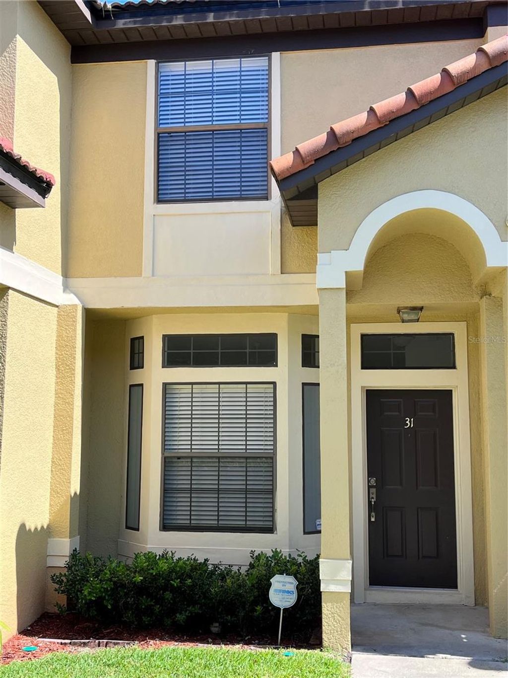 Photo of 6007 Scotchwood Glen #31, Orlando, FL 32822 (MLS # O6397435)
