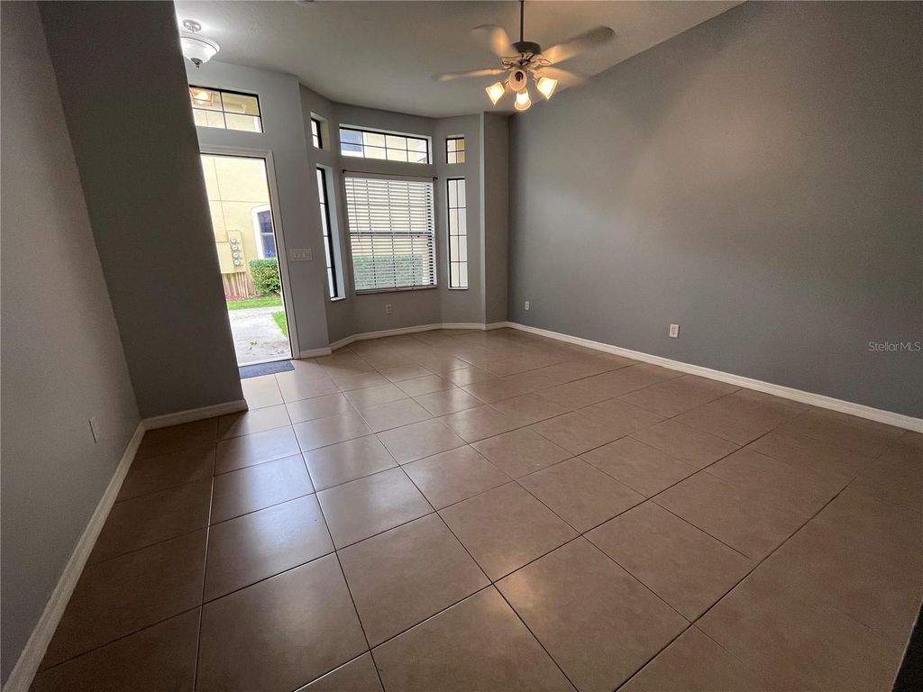 Photo of 6007 Scotchwood Glen #31, Orlando, FL 32822 (MLS # O6397435)