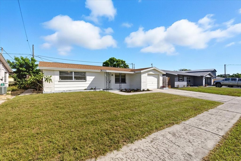 Photo of 5729 Mosaic Drive, Holiday, FL 34690 (MLS # TB8436264)