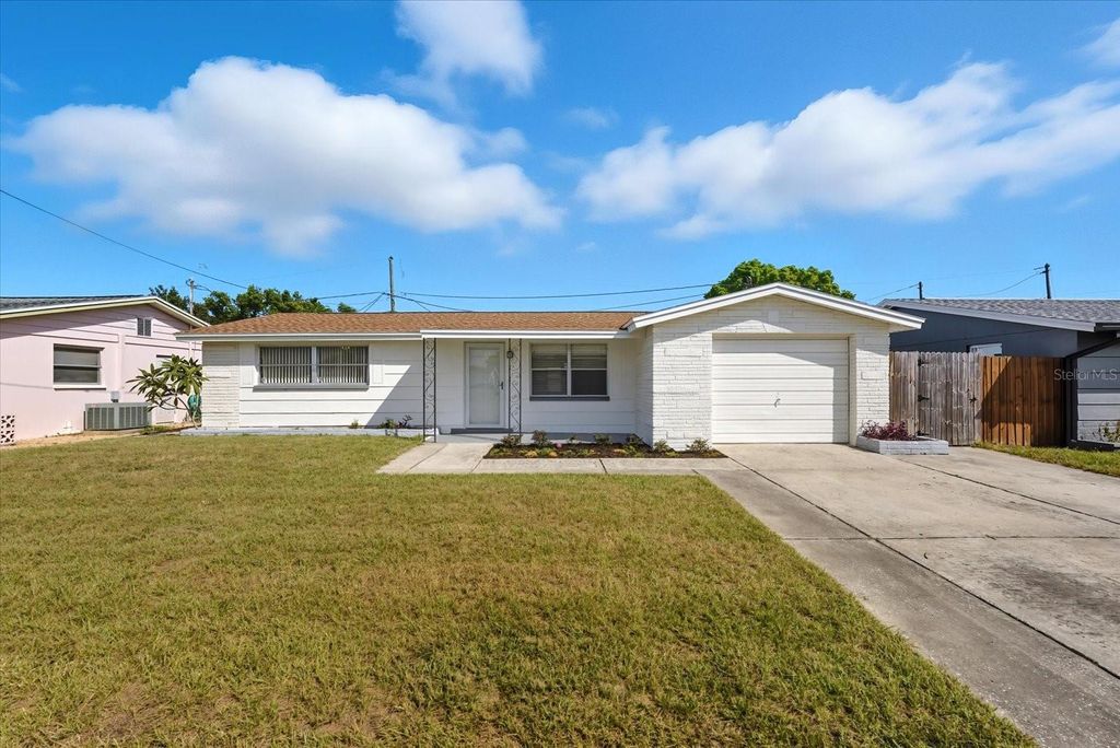 Photo of 5729 Mosaic Drive, Holiday, FL 34690 (MLS # TB8436264)