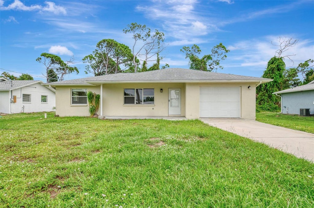 Photo of 1331 Tudor Road, Englewood, FL 34224 (MLS # D6149054)
