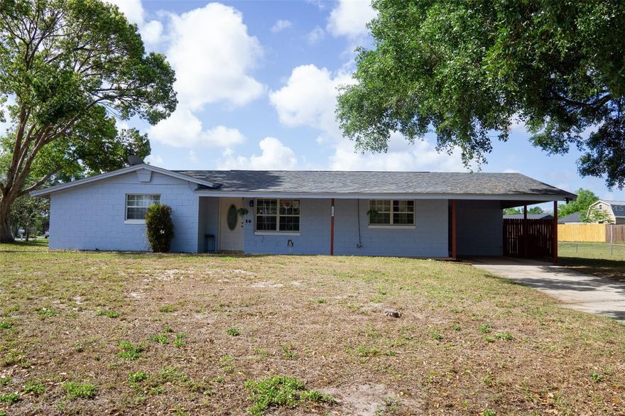 Tucked beneath mature trees on a generous spacious corner lot just over a quarter acre on a dead end street. This inviting home blends cozy charm with laid-back Florida living. From the moment you arrive, you’ll feel the warmth of a space designed for comfort, connection, and flexibility with room to grow. Step inside to a light-filled interior with easy-care tile floors and a natural flow that makes everyday life feel effortless.There’s plenty of natural light, creating a bright and inviting atmosphere. The solar panels keep costs low so you don't have to worry about running the air conditioning all day on those hot summer days. The kitchen offers a welcoming heart-of-the-home feel—perfect for slow mornings, home-cooked meals, and gatherings. You have plenty of space to cook and host in here. Having split style bedrooms allows everyone to have their own space for comfort. The primary room is quite large with a beautiful shower oasis. The two other bedrooms are perfectly located off the kitchen and are great for guests, animals or gaming, with space to work from home from. The hall bathroom has a tub shower if you need to relax after a long day and unwind. The inside laundry room makes cleaning up easy. Out back is where this home truly shines. Multiple outdoor spaces—including a screened porch, open patio to create the perfect setting for quiet coffee mornings, string-lit dinners, or unwinding after a long day. The oversized lot gives you room to breathe, garden, or even expand—offering a sense of space that’s hard to find. This oversized lot provides endless possibilities for your growing needs. Set in an established neighborhood with no HOA, you’ll enjoy both freedom and convenience, just minutes from everything Orlando. Located in the desirable Dover Manor area, this home is conveniently close to the airport, shopping, dining, and major roadways, making commuting and daily errands a breeze.