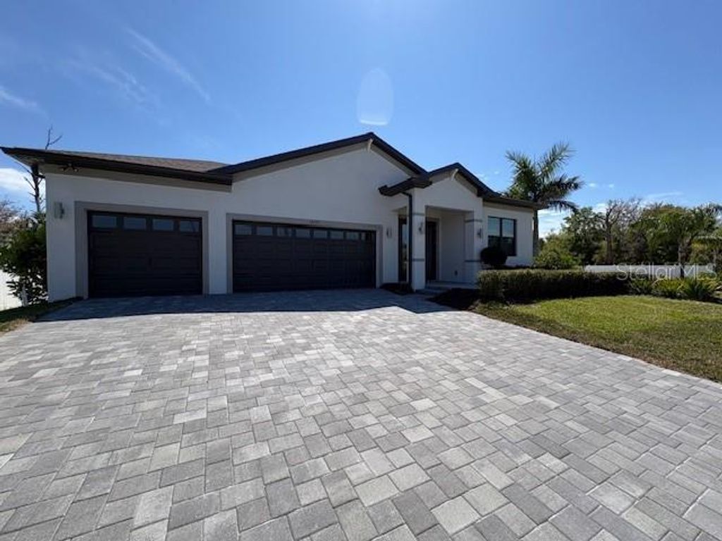 Photo of 14395 San Domingo Boulevard, Port Charlotte, FL 33981 (MLS # TB8490970)