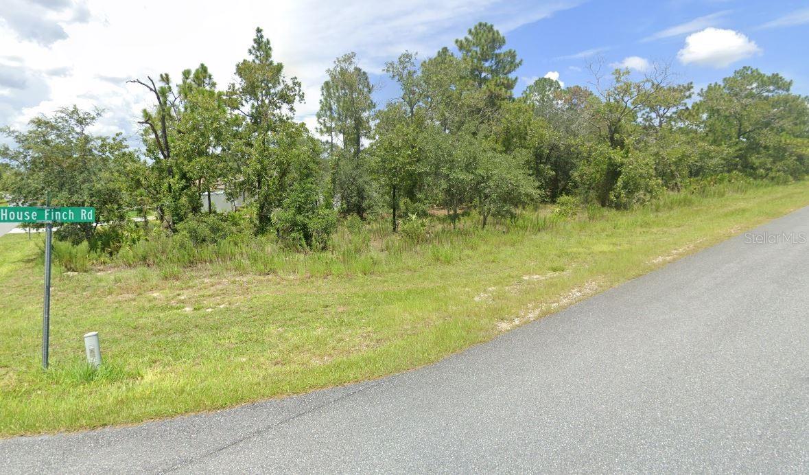 CORNER LOT located in Royal Highlands, surrounded by newer homes. Total land .46 acres. Paved roads. NO HOA or Deed Restrictions. NO FLOOD ZONE. Perfect lot to build your dream home. Swing by and check it out.