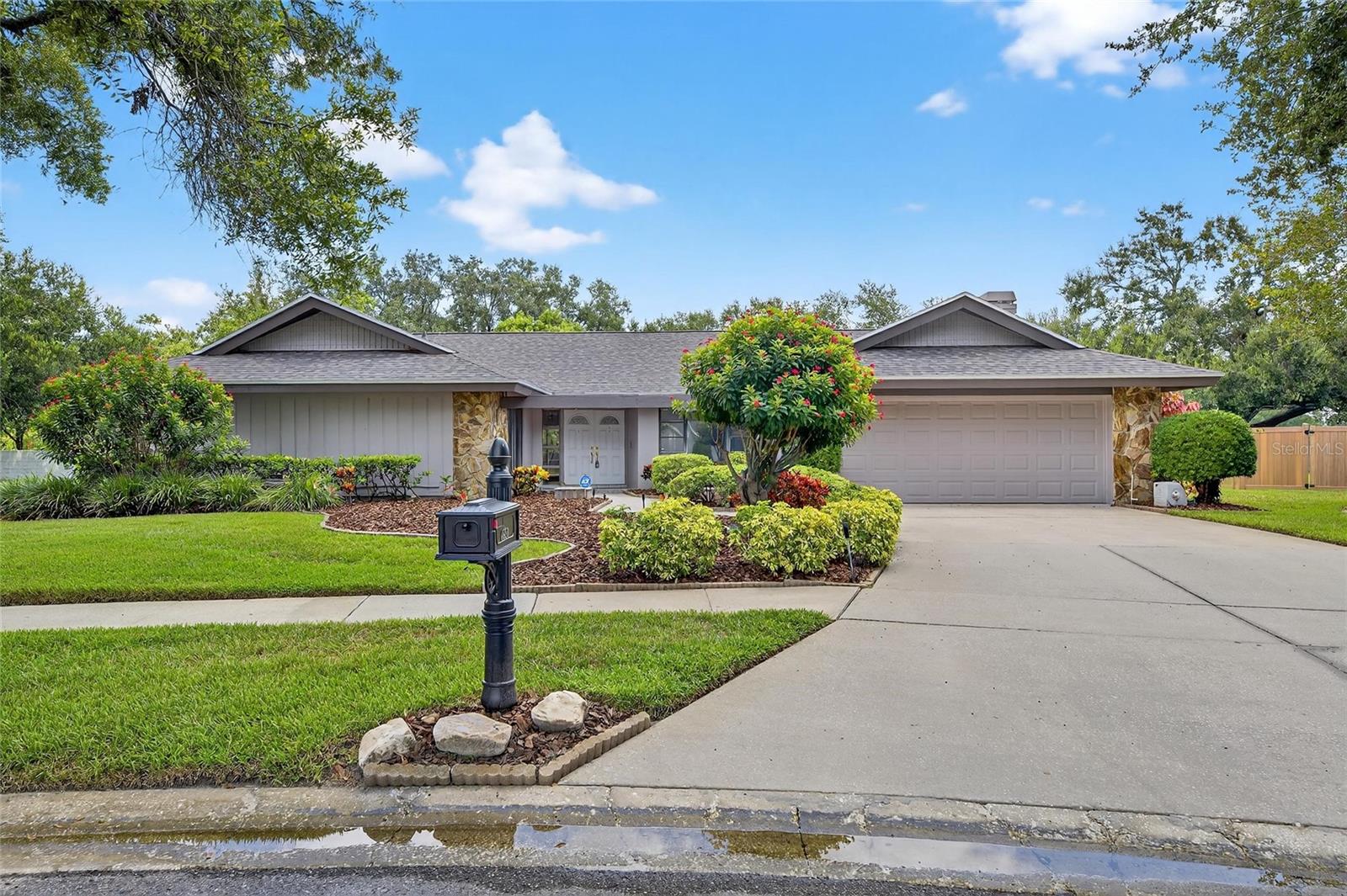 One or more photo(s) has been virtually staged. Charming 4-Bedroom Pool Home in the Heart of Carrollwood – Oversized Lot & Private Oasis
This beautifully 4-bedroom, 3-bathroom pool home is a rare find in the highly desirable Village West community, tucked away on a quiet, tree-lined street with no through traffic. Set on an oversized lot with lush landscaping, majestic oak trees, backyard, this home offers space, privacy, and tranquility—all in the heart of Carrollwood.
With 3,220 sq ft of living space, the thoughtfully designed split floor plan includes a private guest suite with en-suite bath, perfect for visitors or home office. The spacious master suite features direct pool access, a garden tub, walk-in shower, and ample closet space.
Highlights includes ; Gourmet kitchen with Corian countertops, stainless steel appliances, and breakfast bar; Bright and airy living spaces with vaulted ceilings, sliding glass doors, and abundant natural light; Large family room with cozy wood-burning fireplace; Screened-in pool with a covered lanai – perfect for entertaining; Expansive front and back yards ideal for outdoor enjoyment; 2-car garage and low HOA fees. Recent Updates: New roof (2025), New A/C (2021), New water heater (2020). Unbeatable Location: 25 minutes to Downtown Tampa; 20 minutes to Tampa International Airport, International Plaza, and Raymond James Stadium; Walking distance to shopping, parks, Carrollwood Country Club, Carrollwood Village Park with a splash pad, dog park, sports courts, picnic areas, and a community stage hosting regular events and the Carrollwood Cultural Center.
Whether you're hosting gatherings, working from home, or simply relaxing poolside, this home offers the perfect blend of comfort, functionality, and convenience. Schedule your private showing today and experience all that this Carrollwood gem has to offer!