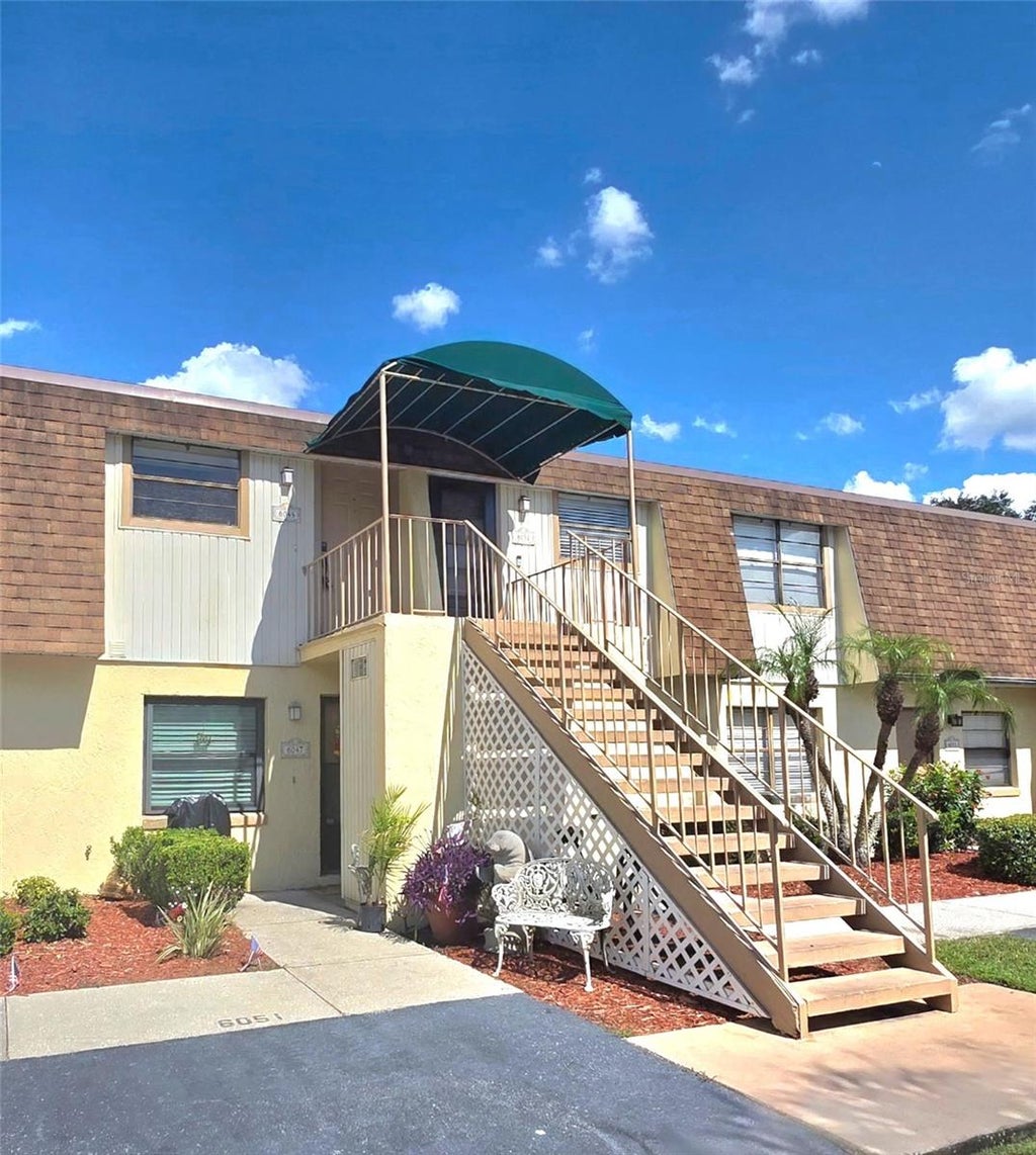 Photo of 6045 Topher Trail #24-C, Mulberry, FL 33860 (MLS # L4964411)