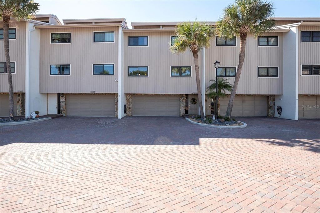 Photo of 12364 Capri Circle N, Treasure Island, FL 33706 (MLS # TB8433887)