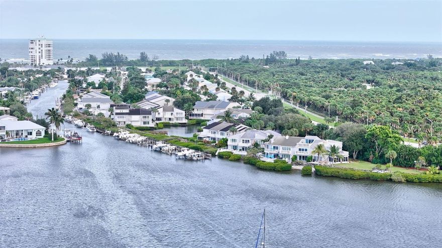 AMAZING waterfront opportunity! This Beautiful 2-story end-unit townhome with sweeping Intracoastal views on North Hutchinson Island. impact windows throughout & all balconies upgraded with composite decking. Featuring 3 bedrooms, 2.5 baths, and a one-car garage, this turnkey home includes a 30' boat slip with boat lift and offers one of the best southeast water views in the community. Move-in ready and designed for relaxation—enjoy the sparkling pool, outdoor BBQ & pet-friendly Community. Minutes To Ft. Pierce Inlet. Make Harbour Cove your own South Florida waterfront retreat!