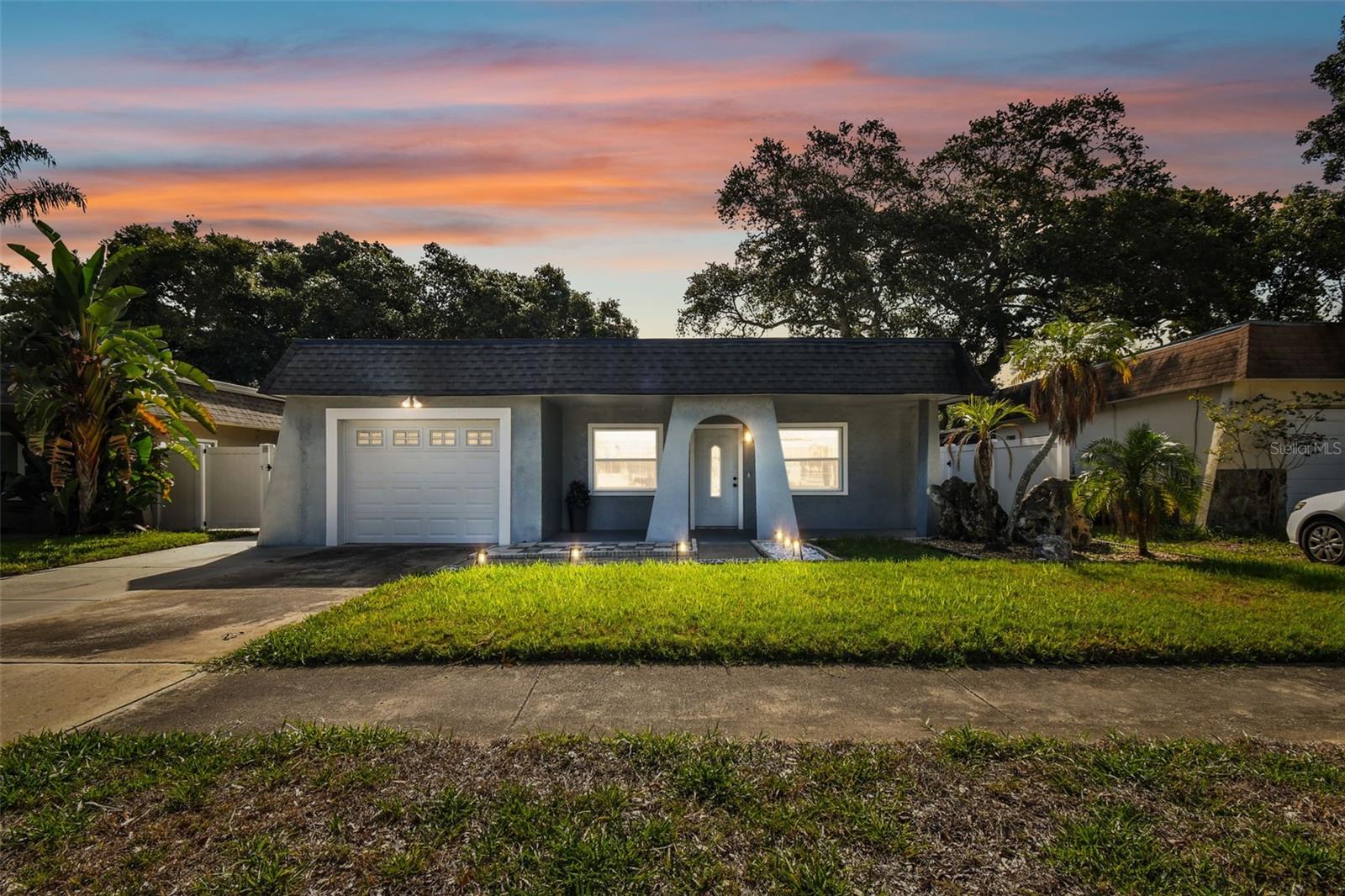 2 BEDROOMS 2 BATH HOME with LARGE FLORIDA ROOM! Great Largo location! Close to the SHOPS at LARGO MALL and just minutes from the GULF BEACHES! This beautiful well-maintained home has NEW TILE flooring throughout! NEWER WINDOWS! FRESH PAINT! Ceiling Fans in both bedrooms and living area! The kitchen is well equipped with lots of cabinets and counter space! This home has a MASTER BEDROOM with an ENSUITE BATH with a WALK-IN SHOWER! The second bedroom shares the hall bath that has been UPDATED! A LARGE FLORIDA ROOM adjacent to the kitchen could be used as a FORMAL DINING ROOM! The SCREENED-IN PATIO overlooks a large backyard with a WHITE VYNILE PRIVACY FENCE! The back yard has a STORAGE SHED for the tenant’s use! The one car GARAGE has been divided into a LAUNDRY ROOM with WASHER & DRYER and a STORAGE AREA with automatic door opener! This home is a MUST SEE and won’t last long! Small Pet OK with a $350 Pet Fee.