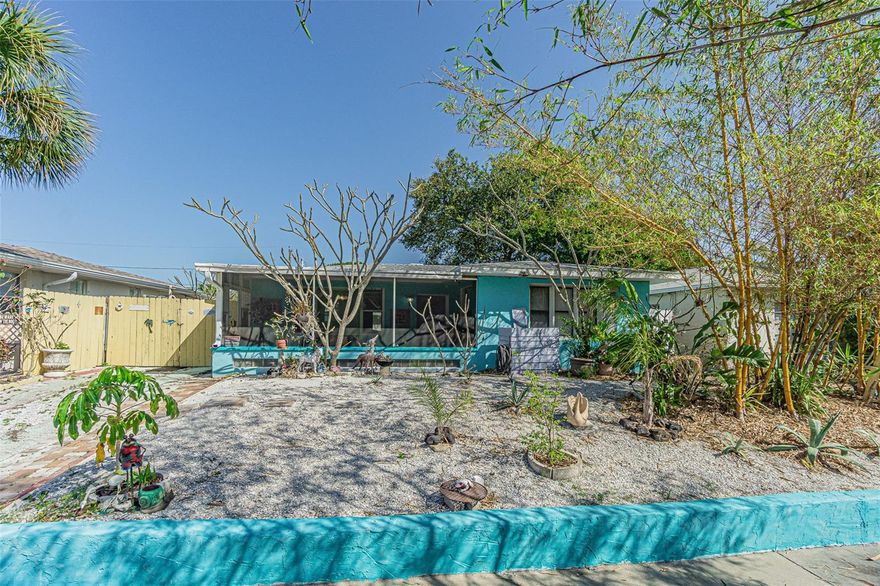 Adorable 2 Bedroom 1 bath main home with a thoughtfully converted garage that now serves as a charming rental unit with its own full bath & private entrance. The property features a large fenced backyard complete with an outdoor shower, a cozy fire pit and practical sheds for all your yard tools. Inside, you will find tile throughout and ceiling fans in every room to stay comfortable during Florida's hot days and nights. An under-sink water osmosis system provides high-quality water for the home. The bathroom gleams with slate tile and the open kitchen design includes a stylish barn-door pantry for extra storage. The dining room offers flexible potential and could be converted into an additional bedroom or Florida room to suit your needs. No flood insurance is required, providing peace of mind. A wood deck off the back door is ideal for BBQs and relaxing evenings. This home sits in a nice quiet neighborhood near the beaches & downtown Clearwater. Its a short drive to local amenities and ready for you to call it Home. Schedule your Showing TODAY!