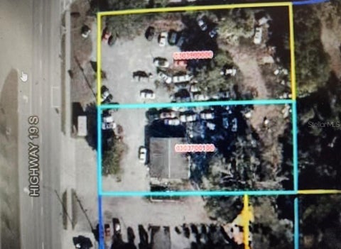 Photo of 123 Hwy 19, Inglis, FL 34449 (MLS # TB8524385)