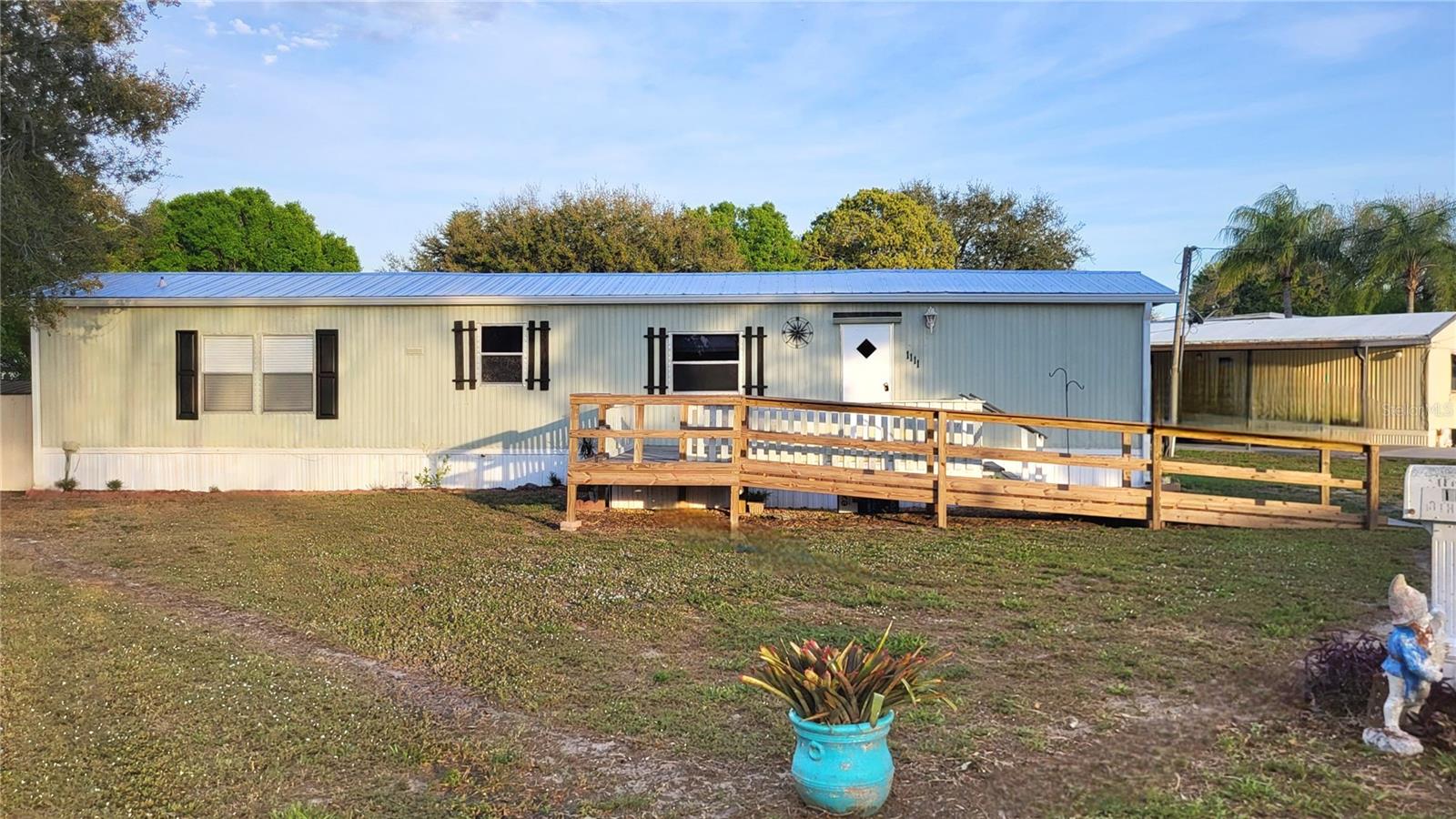 Lake Okeechobee access. Furnished 2/2 on wide, deep canal. Roof 2022, Strong seawall. Composite deck, handicap ramp, storage sheds. No HOA. No flood zone. Buckhead Ridge in Glades County. A quick commute to either coast and 20 miles to the new Seminole Brighton Bay Hotel & Casino. Make this place your winter retreat or year-round home.