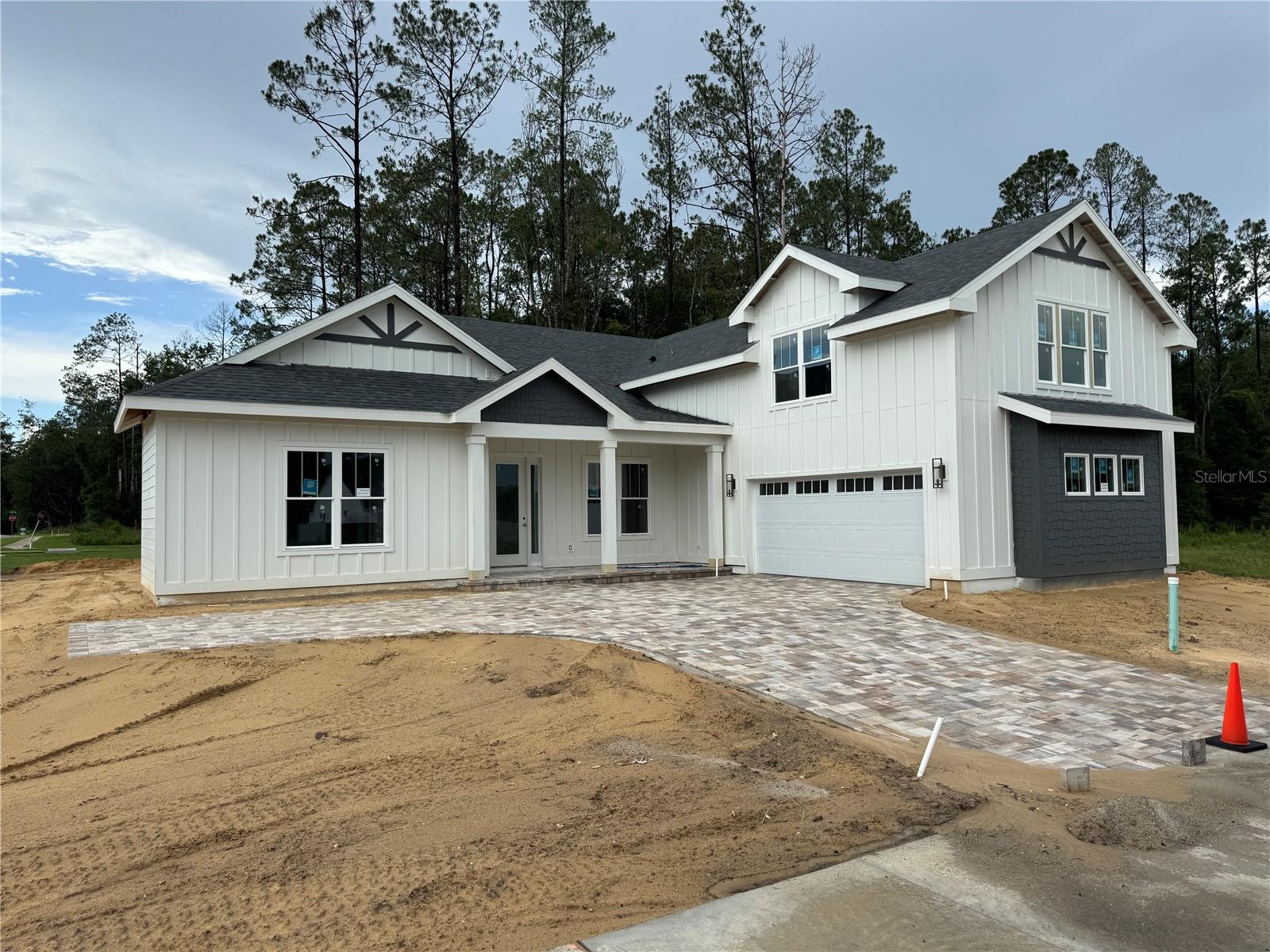 Under Construction. This is a GREAT TIME to buy a new GW Home! Builder Incentive on all Homes! Don't miss the opportunity to be in a new GW Home at a reduced cost. Personalize this home with $35,000 in flexible dollars which can be used towards: Lowering interest rates, covering closing costs, adding upgrades, or towards reducing the purchase price.
GW Homes is committed to having a great reputation by building high quality homes and being there for the buyer after the closing of the home. This reputation has been maintained for over 55 Years and is still going strong!
This newly-modernized GW Homes favorite, the Dakota with the Timeless Artisan Elevation, combines efficient use of space with unparalleled value. This model spreads over 2500 square feet of luxurious living space between 3 bedrooms, 3.5 baths, a Study downstairs, and a huge 4th bedroom/Bonus Room with a full bathroom upstairs. The well appointed Kitchen has a long bar top for extra seating and opens out to a spacious Great Room and Breakfast area. The Primary Suite has separate his and her walk-in closets and a beautiful Master Bathroom. A half bath (powder room) is conveniently placed outside of the Study room. Enjoy roomy 10 foot ceilings throughout the entire home, wood cabinets, and laminate flooring in all of the common areas. Additional features include a tankless water heater, smart home technology features, and luxurious interior design selections.
Come out TODAY to discover Laureate Village, GW Homes' newest exclusive community, meticulously crafted for those who desire luxury, convenience, and a contemporary lifestyle in the heart of Alachua County. This exceptional neighborhood offers residents a perfect balance of relaxation and recreation, featuring a private community pool, playground, pickleball court, golf putting green, and beautifully landscaped green spaces interwoven with scenic walking trails.
Experience sophisticated living in our newly designed, climate-sealed homes, showcasing the high-end finishes that define the renowned GW Homes standard. Situated in the sought-after Southwest Gainesville area, Laureate Village provides effortless access to the vibrant retail and dining options at Tioga Town Center, as well as seamless connectivity to I-75 and The Oaks Mall. Furthermore, the proximity to Shands and the University of Florida, both less than 15 miles away, adds unparalleled convenience for homeowners.