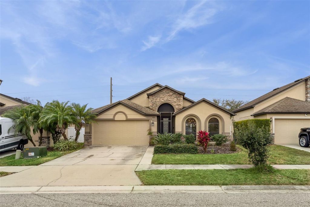 Photo of 6601 Boulder Run Loop, Wesley Chapel, FL 33545 (MLS # O6375418)