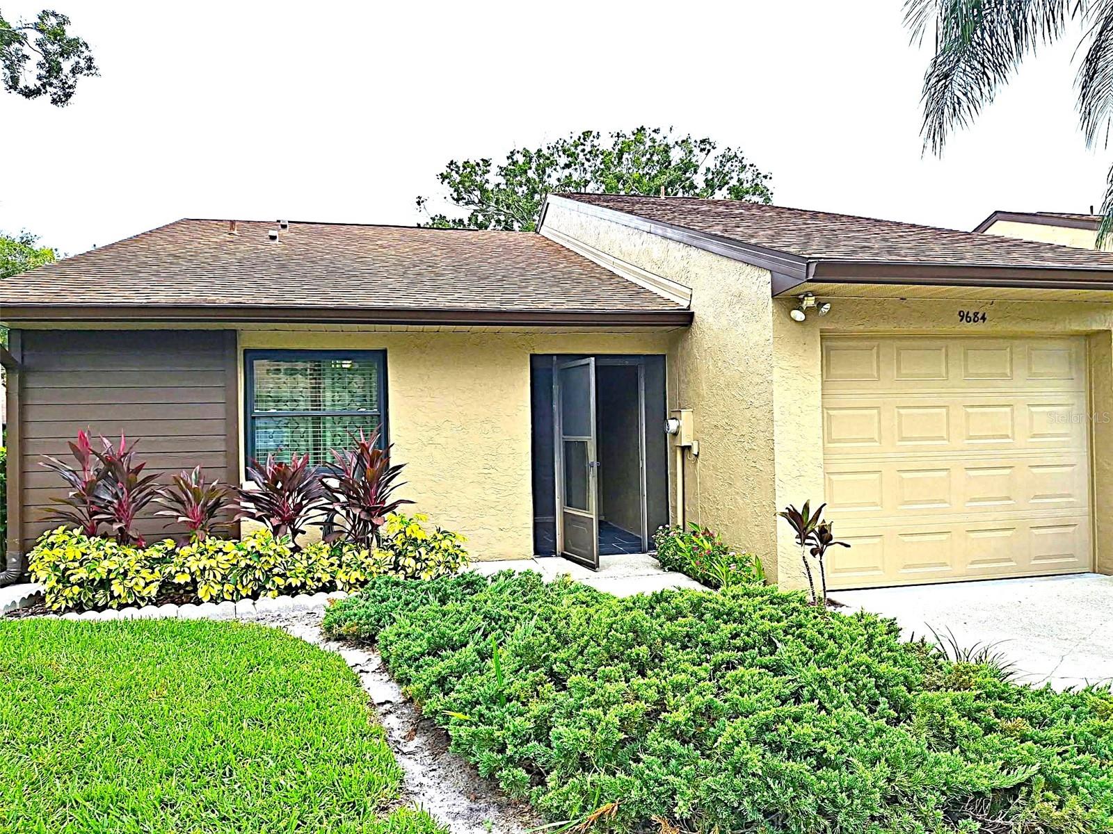 Experience Comfort, Style, and the Perfect Location! Low HOA, No Flood Insurance Required! Welcome to this spacious, fully remodeled 2-bedroom, 2-bath villa with a garage, nestled on large corner beautiful lot in the highly desirable Lake Seminole Village community of Pinellas County. Step inside and be greeted by soaring cathedral ceilings and a sun-filled, open layout that instantly feels like home. The eat-in kitchen is a chef’s dream, featuring abundant white cabinetry, stunning quartz countertops, and brand-new appliances—ideal for both everyday meals and entertaining guests, new hurricane proof windows, new water heater, newer AC. Both bathrooms have been beautifully updated with new tile, fresh paint, modern vanities, and stylish flooring. Enjoy the convenience of a separate laundry room with a modern washer and dryer, plus a large garage offering extra storage and parking. Some furniture is optional, making your move even easier. Relax in the spacious Florida room or host a barbecue on your beautiful outdoor patio—perfect for soaking up the Florida sun or gathering with friends. Rest easy knowing this home requires no flood insurance and sustained zero hurricane damage from last summer’s storms—a secure and smart investment for peace of mind. Live the Florida lifestyle with Seminole Park just a short walk away and the stunning Gulf beaches only a 10-minute drive from your door. Surrounded by fantastic shopping and dining options, this villa truly has it all. Enjoy carefree living as rent includes lawn care, cable, and internet. Don’t miss your chance to own a piece of paradise in Lake Seminole Village!