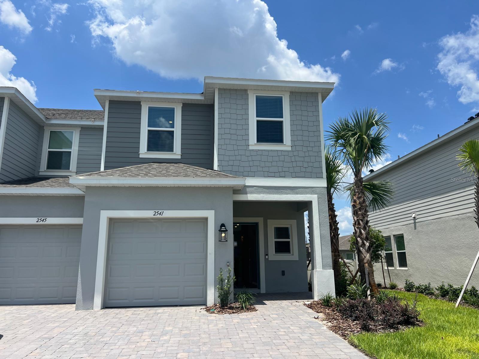 Be the first to live in this brand-new construction townhome offering 3 bedrooms, 2.5 bathrooms, and a 1-car garage. This never-before-lived-in home features an open-concept layout that provides a bright and airy ambiance, highlighted by a spacious great room and a modern kitchen with a large island—ideal for everyday living or entertaining guests. Step outside to a large rear patio, perfect for outdoor relaxation. Upstairs, you’ll find two comfortable bedrooms that share a full bathroom, along with a spacious primary suite featuring an oversized walk-in closet and a dual-sink vanity. Thoughtful storage solutions include a walk-in kitchen pantry, under-stair storage, a laundry room, linen closet, and ample bedroom closet space.