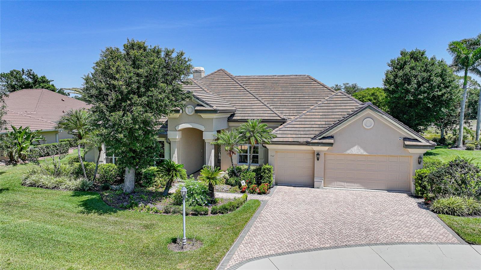 Experience refined living in this exceptional 4-bedroom, 3-bathroom residence nestled within the prestigious gated community of Bobcat Trail. Designed with both elegance and comfort in mind, this home welcomes you with soaring ceilings, expansive living spaces, and timeless architectural details. The gourmet kitchen offers abundant cabinetry, generous counter space, and a seamless flow into the main living and dining areas—perfect for both intimate gatherings and grand entertaining. The primary suite serves as a true retreat, featuring a spa-inspired bathroom and expansive closets. Three additional bedrooms provide comfort and versatility for family or guests. Step outside to your private sanctuary where a sparkling pool and spa are set against a backdrop of lush landscaping, creating the ultimate space for relaxation and outdoor enjoyment. With abundant storage, thoughtful design, and unmatched attention to detail, this home is the perfect blend of luxury and livability—all just minutes from championship golf, fine dining, and the best of Southwest Florida.