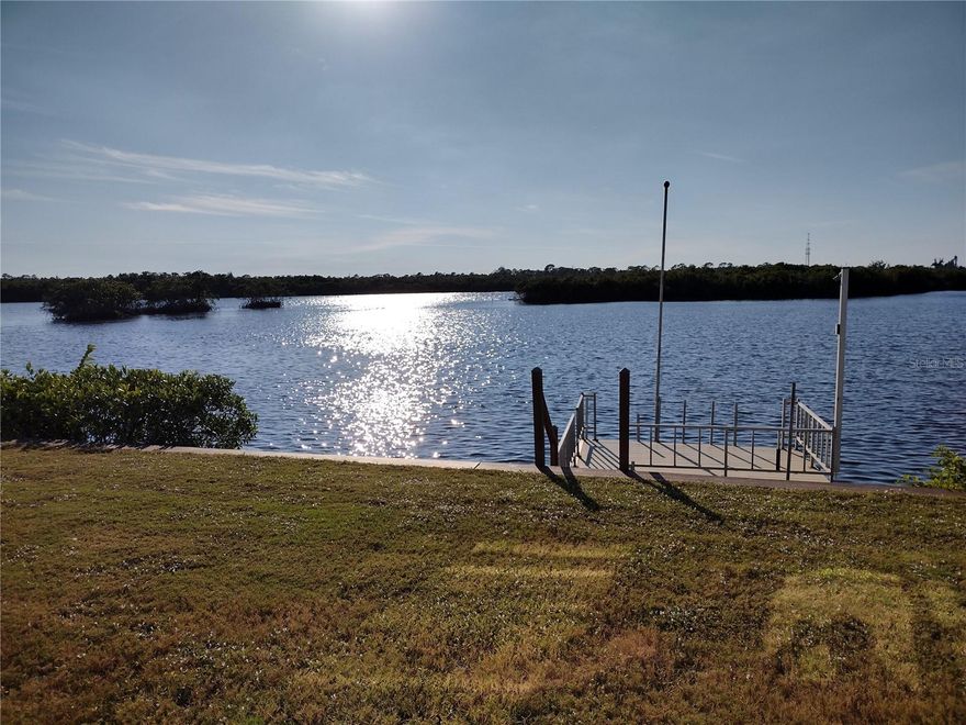 Waterfront property located on the Myakka River in the premier community of Lazy River Village. About 1500 sq ft manufactured home with spectacular sunset views. It includes two bedrooms, two baths, living room, dining area. Updated kitchen with with view of the river from the kitchen. Walk in closets with ceiling fans in all rooms. Private boat dock. Enjoy resort living with many activities and clubs. Fully equipped wood shop, along with a community pool, tennis and pickleball courts, workout center and other amenities. HOA dues include internet and cable TV, weekly garbage pickup, lawn cutting, upkeep of all amenities, pool, hot tub, fitness room, clubhouse, etc. This home is part of Lazy River Village, a 55 and over active community. Tons of activities to keep you busy. Never boring if that's your choice. The water view is very calming from your Lazy boy chair in the Living room.