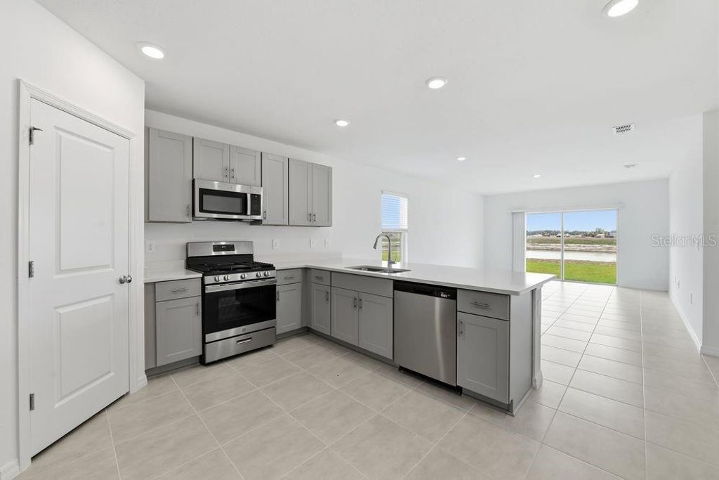 Photo of 13231 Commons Avenue, Parrish, FL 34219 (MLS # TB8436348)