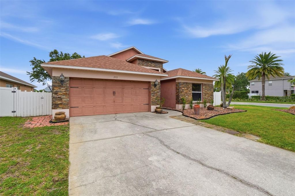 Photo of 1892 Nestlewood Trail, Orlando, FL 32837 (MLS # O6413784)