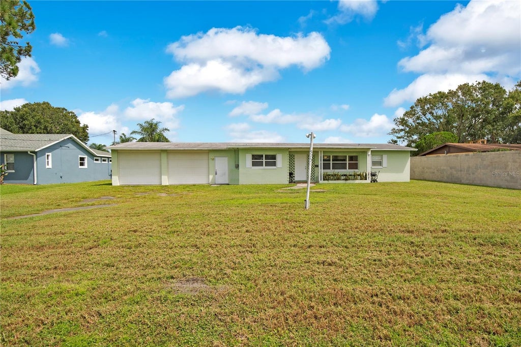 Photo of 5701 Padgett Circle, Orlando, FL 32839 (MLS # O6443651)