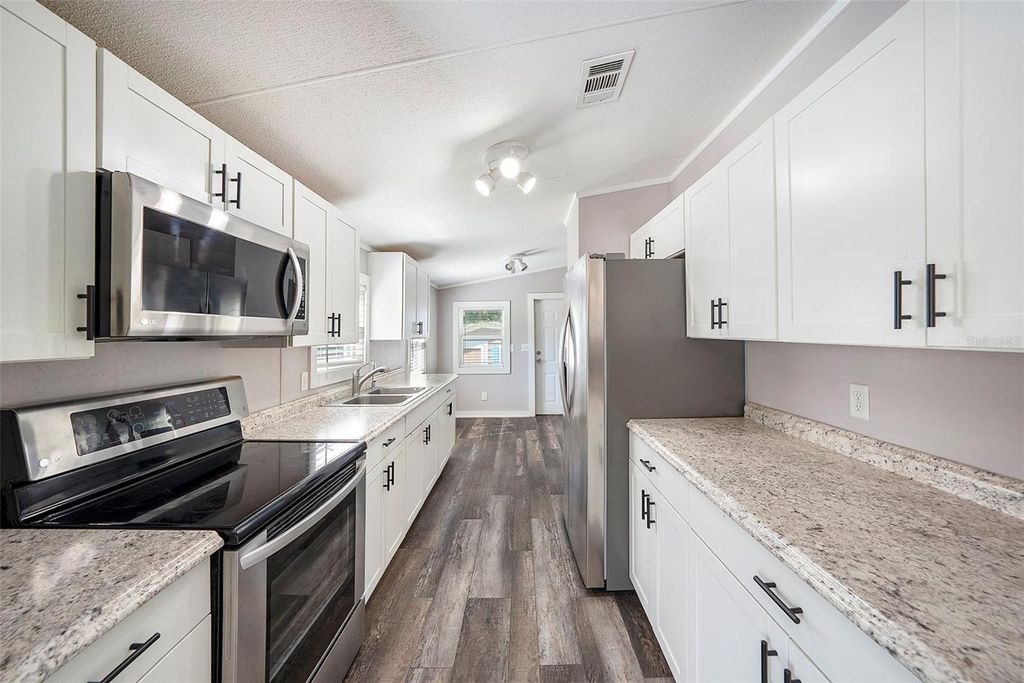 Photo of 2121 Odessa Gardens Lane, Odessa, FL 33556 (MLS # TB8401193)