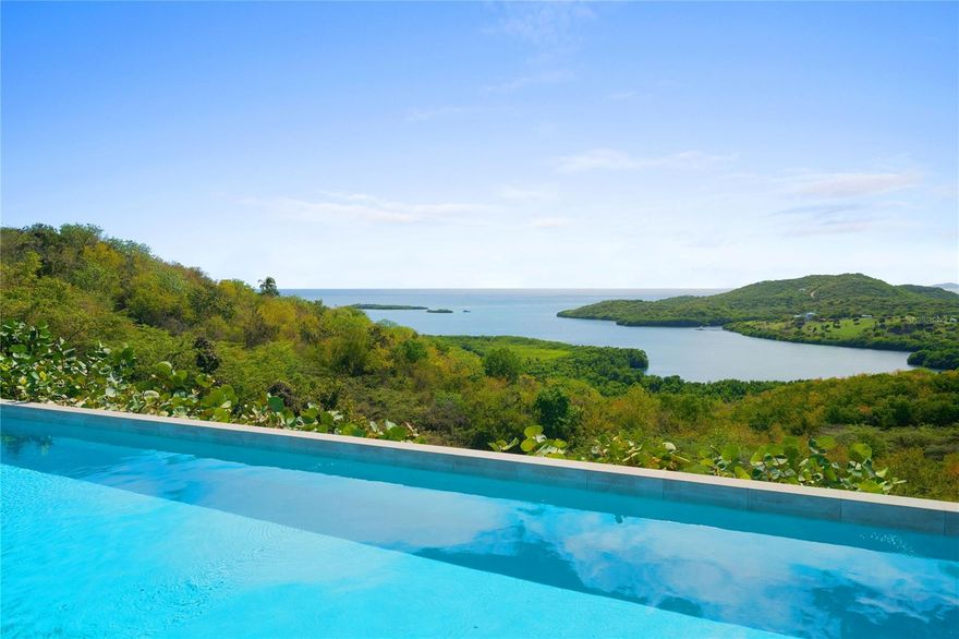 Designed to embrace the island’s natural beauty, Casa Las Pelás welcomes you with light filled living spaces where panoramic ocean views unfold the moment you arrive. The endless horizon becomes an integral part of the home, shaping how each space is experienced from the very first step inside.

Elevated above Las Pelas Bay, this residence designed by architect Pedro Rodríguez Flores offers a rare balance of openness and privacy. The living room opens directly onto an expansive terrace that forms the heart of the home, creating a seamless flow between indoor living and open air spaces ideal for entertaining, relaxation, and quiet moments.

Vaulted ceilings enhance the home’s airy atmosphere, while both the living areas and all bedrooms connect effortlessly to the outdoor living spaces, where an infinity pool overlooks the ocean, inviting you to unwind as you take in the views, feel the ocean breeze, and listen to the surrounding sounds of nature.

The two primary suites, both located on the main level, enjoy the same commanding ocean views and are designed as equal retreats. Each features a beautifully appointed en suite bathroom with an interior shower, complemented by an additional private outdoor shower, offering a daily ritual that encourages disconnection from everyday life and a deeper connection with the natural surroundings. A third bedroom on the lower level provides flexibility for guests or family, while maintaining the home’s sense of privacy and comfort.

Set on five acres of pristine land, Casa Las Pelás offers a level of space and privacy rarely found in Culebra. Designed for long term comfort and resilience, the home is connected to municipal power and water, and is complemented by a backup solar energy system with 52 solar panels and three Tesla batteries, along with a 50,000 gallon water cistern. A 120 foot community dock offers easy access for boat owners and island hopping enthusiasts.

Casa Las Pelás is a refined tropical retreat defined by privacy, autonomy, and an uninterrupted connection to the horizon.