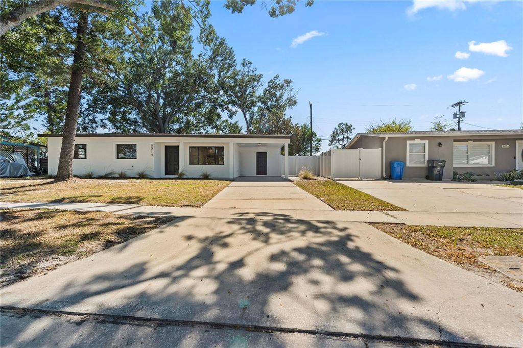 Photo of 8014 W Comanche Avenue, Tampa, FL 33615 (MLS # TB8396569)