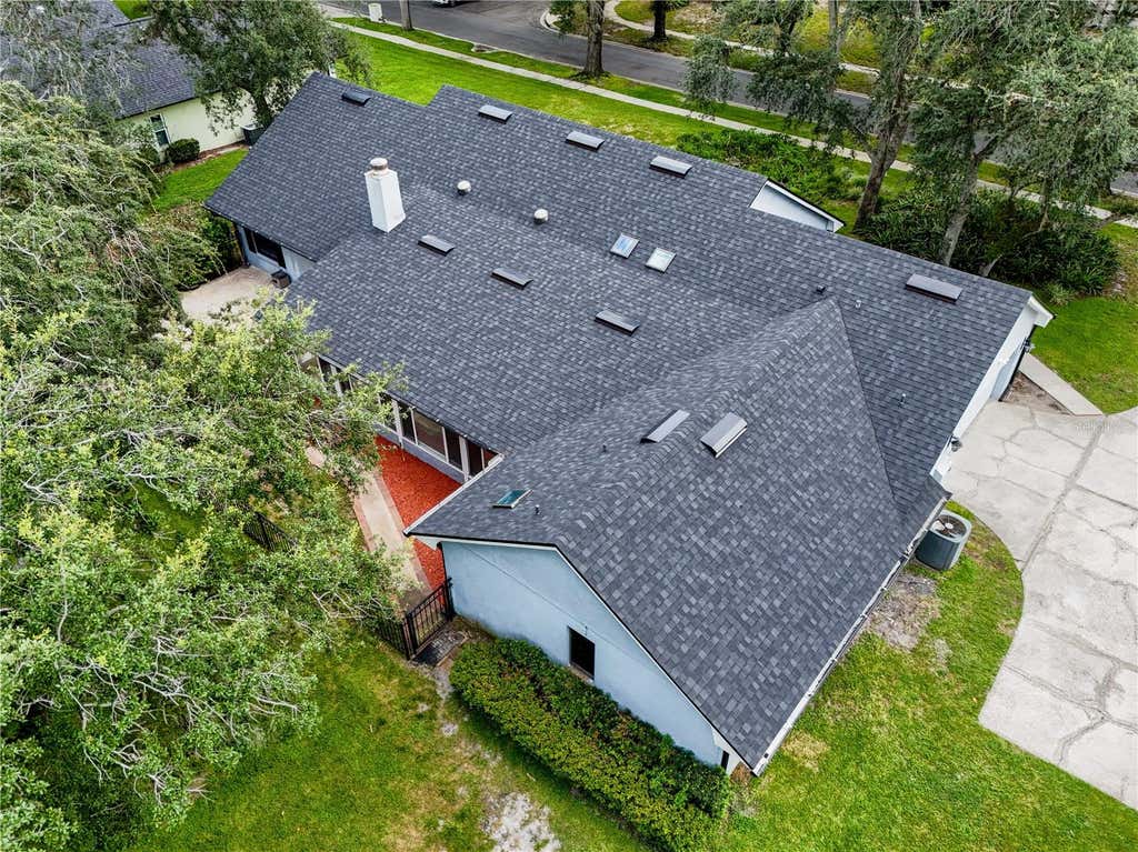 Photo of 7141 Wooded Village Lane, Orlando, FL 32835 (MLS # O6436400)