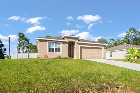 Photo of 597 J T Sancho Street, Palm Bay, FL 32908 (MLS # O6323047) Photo of 597 J T Sancho Street, Palm Bay, FL 32908 (MLS # O6323047)