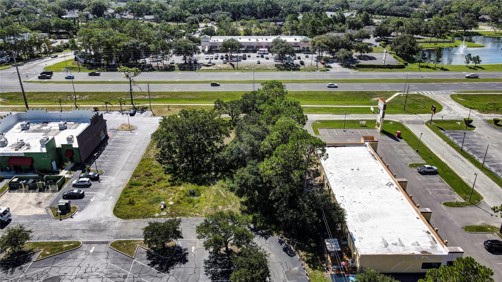 COMMERCIAL WAY COMMONS - Land