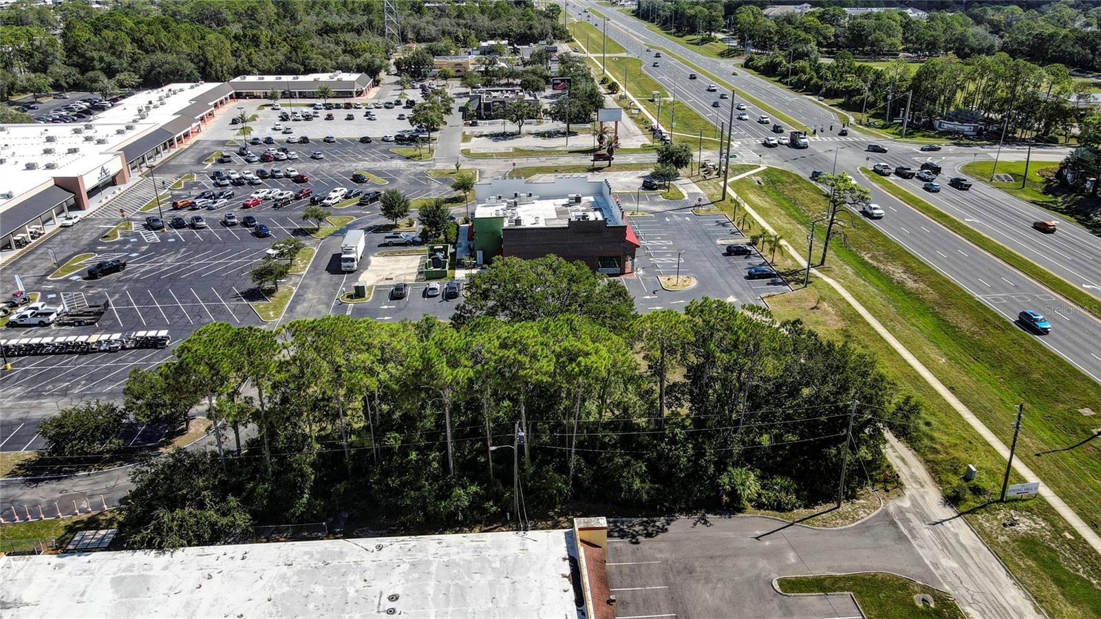 COMMERCIAL WAY COMMONS - Land