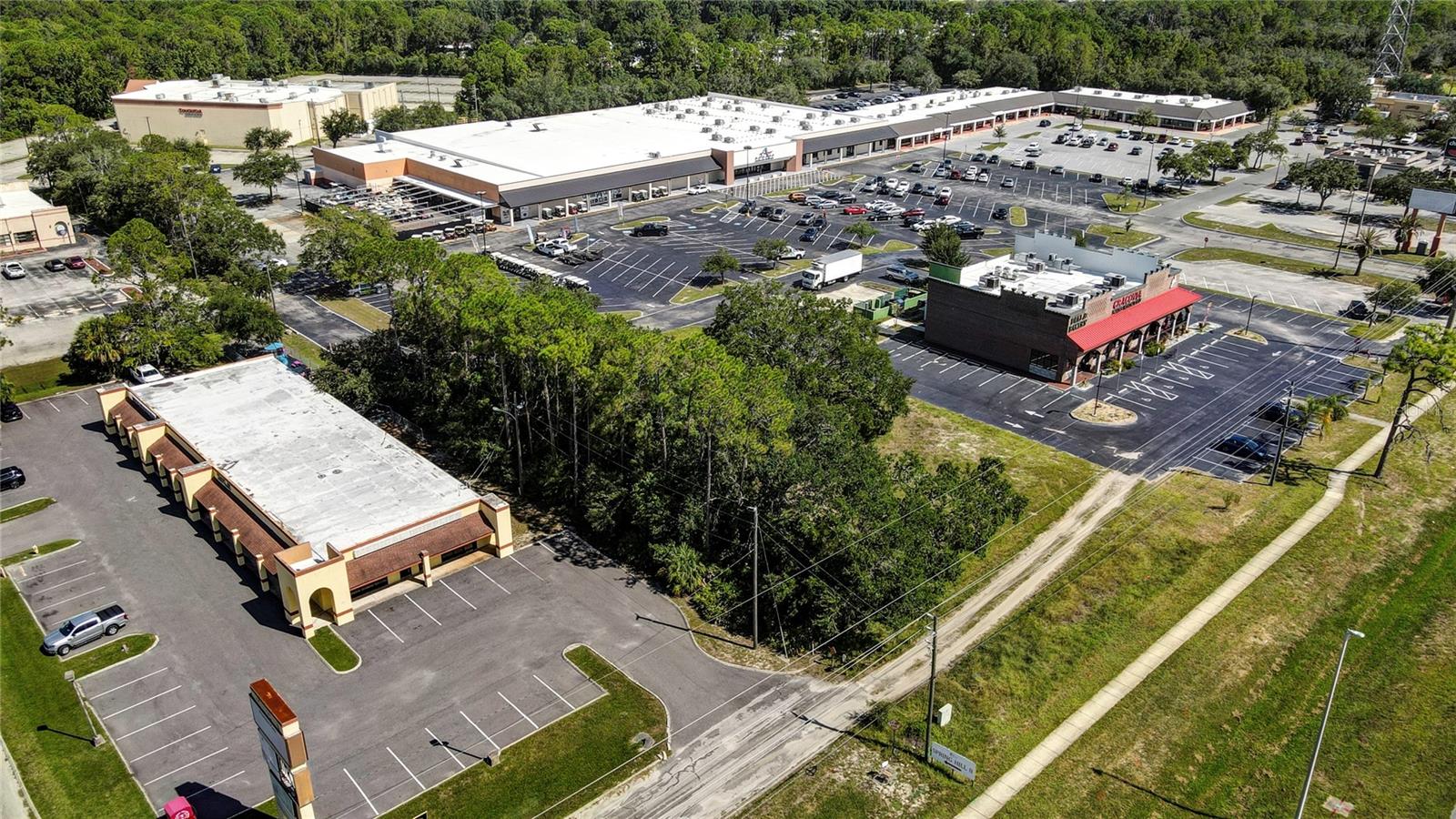 COMMERCIAL WAY COMMONS - Land