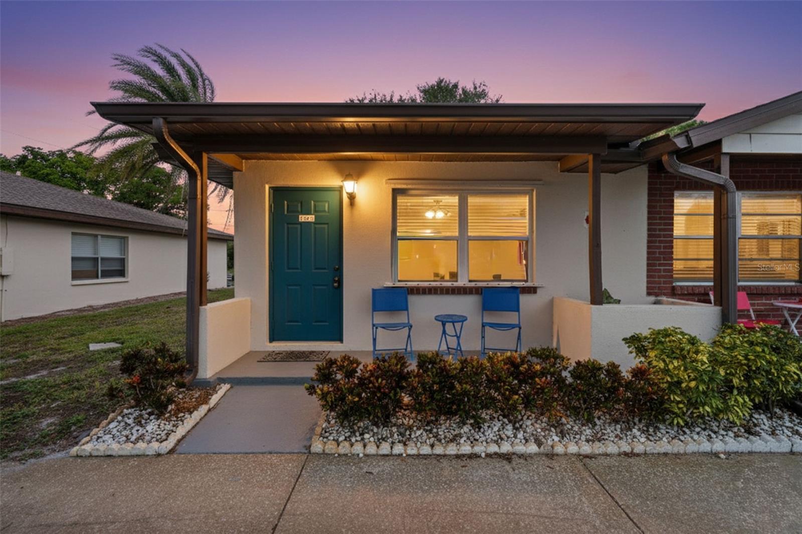 One or more photo(s) has been virtually staged. Charming 1-bedroom, 1-bath villa perfectly located just off US-19 in Clearwater, offering unmatched convenience near Westfield Countryside Plaza, Mease hospitals, Whole Foods, Aldis, tons of grocery options, fabulous dining, and just a short drive to the award-winning Clearwater Beach!
This rare end-unit sits privately tucked in the corner of the community with no rear neighbors, your own concrete garden bed, expansive yard space, and true single-family home vibes. Nearly 600 sq. ft. of bright, open living space feels larger thanks to ample natural light, newer energy-efficient windows, and a screened-in porch that adds about 150 sq. ft. of extra outdoor living space. The full-size washer and dryer are located here; leaving plenty of room to create your own cozy den, utility space, or just a quiet nook to relax and enjoy the peaceful view!
Inside, you’ll find wall-to-wall closets in the primary bedroom, a pantry near the kitchen, and attic access with great extra storage. Updates include fresh paint throughout, energy-efficient windows (2014), new ceiling fans (2025), a brand-new front door (2025), and a new HVAC system (2022).
The roof is maintained by the association and was recently replaced (late 2024) for added peace of mind. The community has really been spruced up with fresh exterior paint, new carports, new front doors, and freshly paved asphalt (2025) Hill Crest is looking better than ever.
Amenities include a pool, clubhouse, and beautifully maintained grounds. The clubhouse features a kitchen, tables, pool table, and a >>>private sauna<<< for residents, all accessed by a secure key fob. It’s an all-age community with affordable HOA fees.
It’s a simple, clean, well-maintained villa that’s move-in ready and updated where it counts. For the price, you truly get a lot… a peaceful corner unit, solid updates, and a community that’s being cared for. Perfect for first-time buyers, snowbirds, or anyone looking for low-maintenance living in a prime Pinellas location!