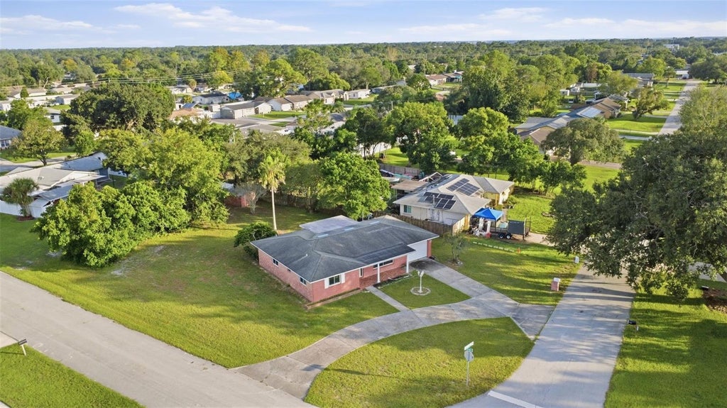 Photo of 1115 Eagles Nest Avenue, Deltona, FL 32725 (MLS # V4951386)