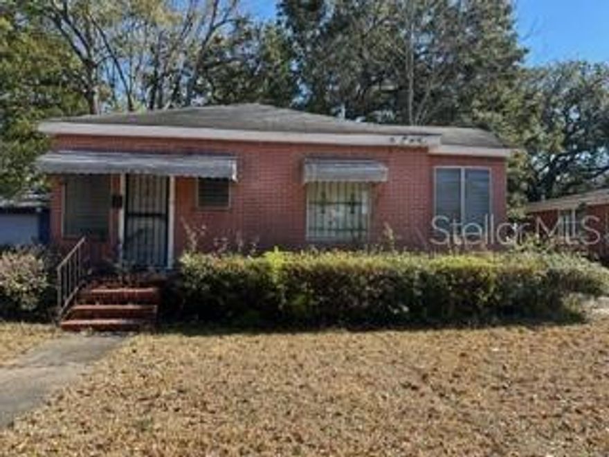 A Diamond in the Rough!  This solid block home it situated in the well-established historic Durkeeville neighborhood. Bring your imagination and turn it into your dream home or investment property.  Trustee Sale
