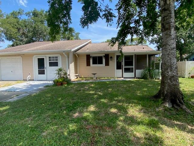 Cute Townhome with community pool! 2 bedroom 2 bath townhome is centrally located in Port Orange with quick access to shops, colleges, and a 7 min drive to the Sunglow pier at the beach. Complete with enclosed rear porch, fenced yard, front porch, shed, and all appliances. The garage has been converted to living space so there is a bonus room which could be used as an office, craft room, or play area. The community pool is directly across the street just steps away. Roof replaced 11 years ago. Located on a cul-de-sac street.