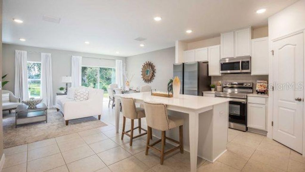 Photo of 3512 Eagles Crossing Way, Lakeland, FL 33803 (MLS # O6401138)