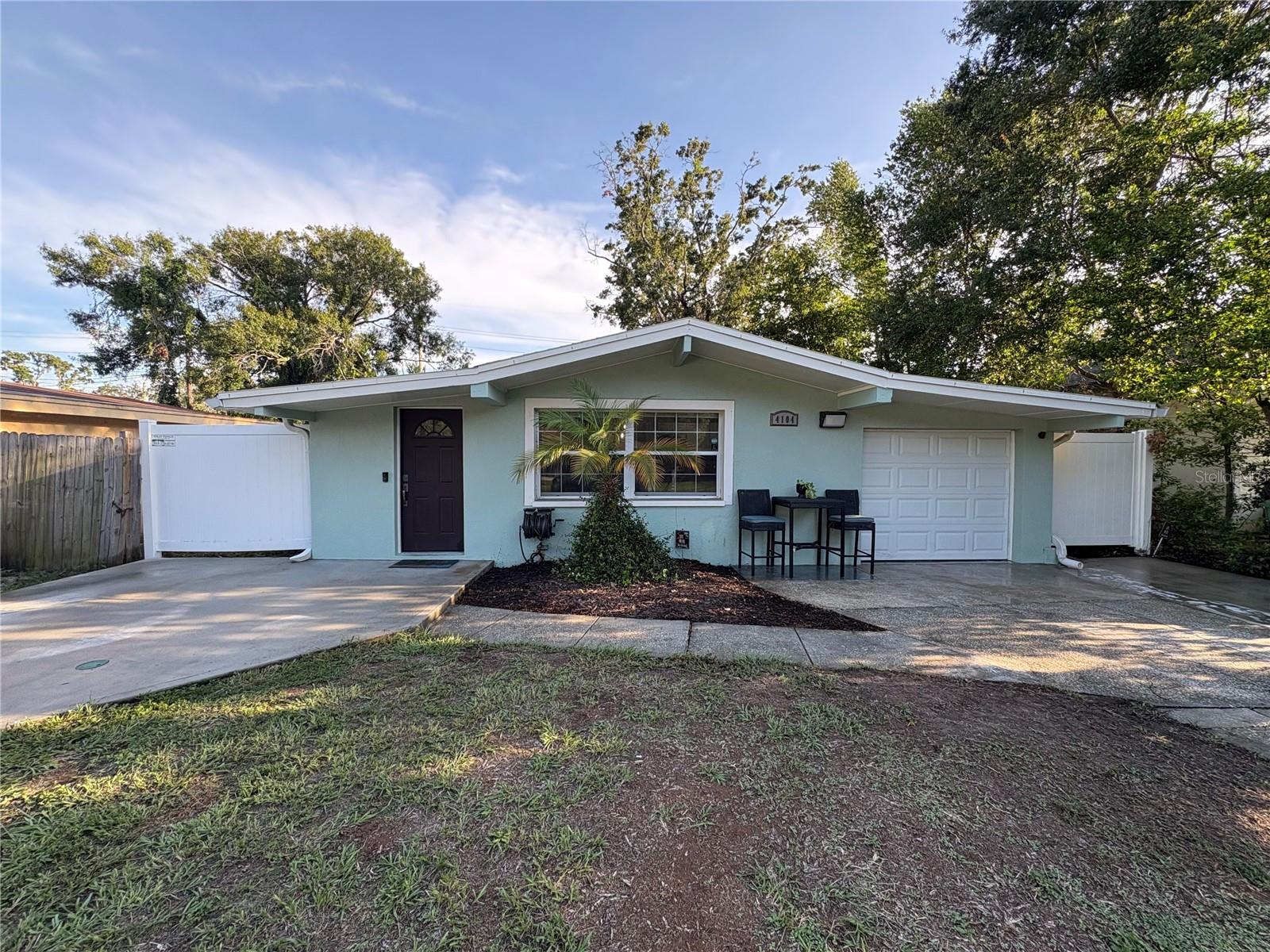 Welcome to your dream rental! This fully furnished 3-bedroom, 1-bathroom home is perfectly situated in Tampa, offering unbeatable convenience and walkability. Just steps from Midtown Tampa and International mall, minutes from downtown, Raymond James Stadium, Westshore, and the University of Tampa, this location puts you in the center of it all. Whether you're commuting, traveling, or looking to enjoy the best dining, shopping, and entertainment the city has to offer, everything is within easy reach. Inside, the home features an open floorplan that combines the living, dining, and kitchen areas into one bright, functional space. It comes fully furnished with thoughtfully selected furniture, décor, and household essentials—making it completely move-in ready for short or long-term stays. The fenced-in backyard is a private outdoor retreat with a fire pit and seating area, ideal for relaxing or hosting. Additional highlights include two oversized driveways, a one-car garage, and an in-home laundry room with a working washer/dryer and accompanying storage. Don't miss out on this great find! Please reach out for more details or to schedule a showing!
