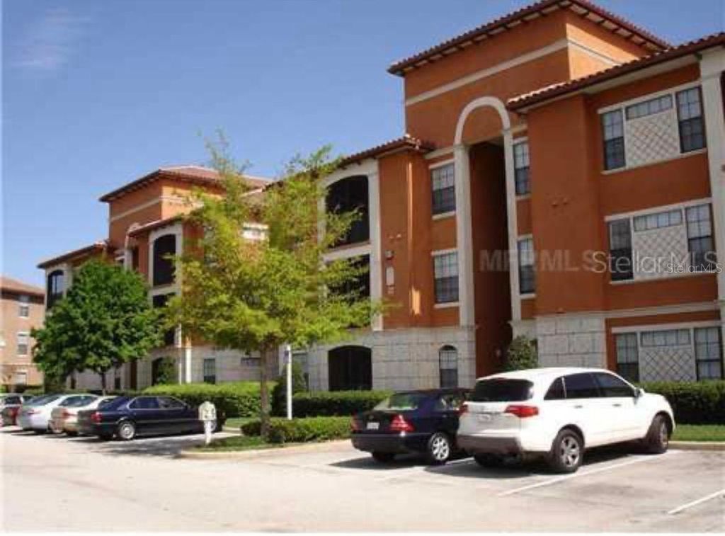 Photo of 6149 Metrowest Blvd #303, Orlando, FL 32835 (MLS # O6408396)