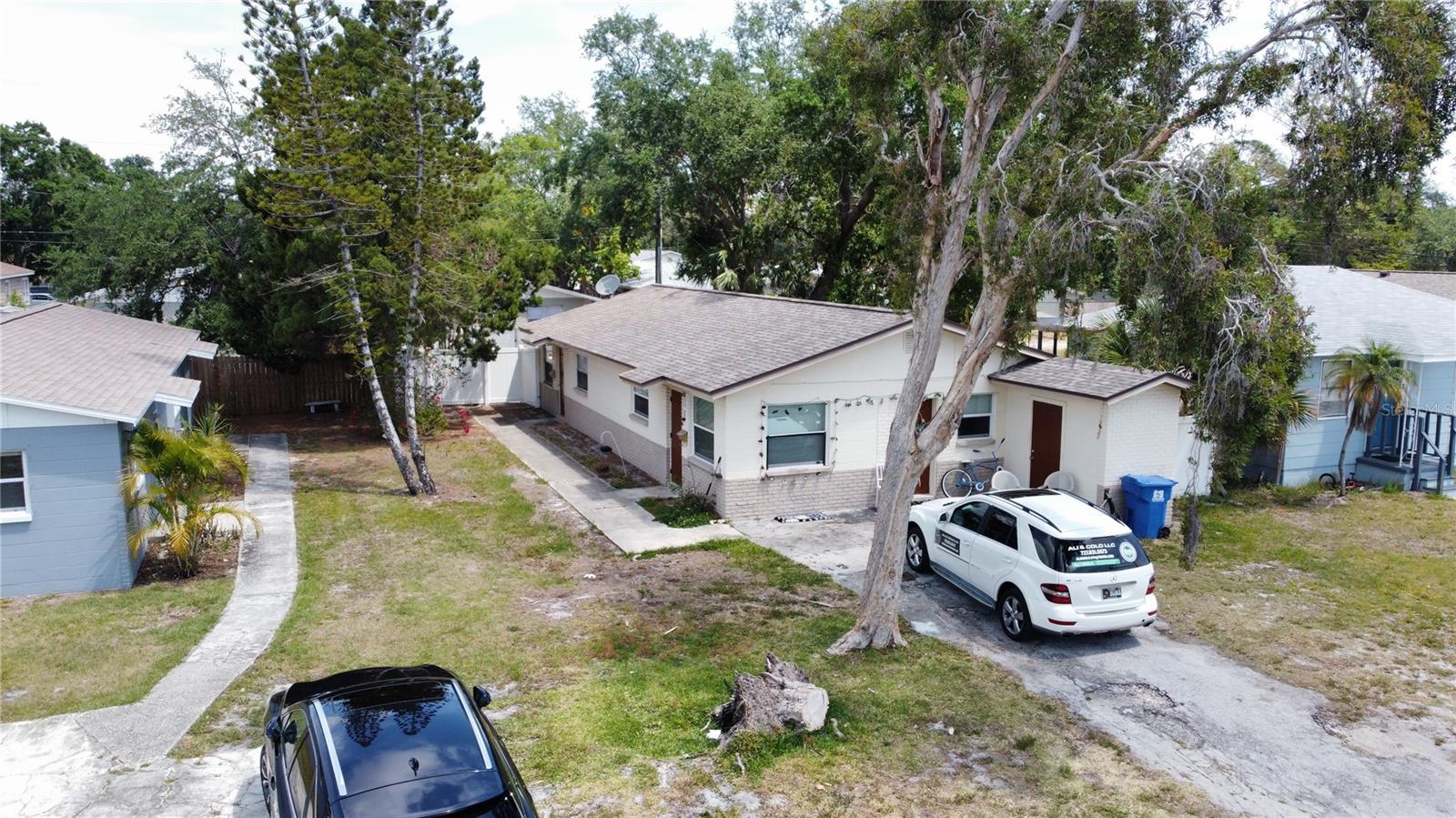 This rare investment opportunity offers solid construction, prime location, and strong upside in the heart of St. Petersburg. Centrally located just minutes from downtown, waterfront parks, shopping, and award-winning Gulf beaches, 521 88th Ave N blends durability and location with serious investment potential. Built in 1973 with concrete block construction, this income-producing duplex features two separate 2-bedroom, 1-bathroom units, each offering central heat and air, private storage rooms with washer/dryer hookups, and individual electric and water meters, allowing tenants to pay their utilities. The back unit enjoys private alley access with its own dedicated parking space, offering additional convenience and flexibility.
Several important upgrades are already in place, including a newer roof installed in 2017 and brand-new windows that have been fully paid for and are scheduled to be installed by mid-July 2025. Located on a quiet residential street yet close to downtown St. Pete’s vibrant restaurant scene, shopping, arts, waterfront parks, and both St. Pete–Clearwater and Tampa International Airports, it offers unbeatable accessibility for future tenants and owners alike. Importantly, the property experienced its first storm-related impact during hurricanes of 2024, but had no previous history of flooding, highlighting its location within a historically stable and high-demand part of the city.
Whether you’re looking to expand your investment portfolio, live in one unit while renting the other, or capitalize on Tampa Bay’s ongoing growth, 521 88th Ave N is a rare opportunity that combines strong rental potential, flexible use, and an exceptional location. Easy to show — schedule your private tour today!