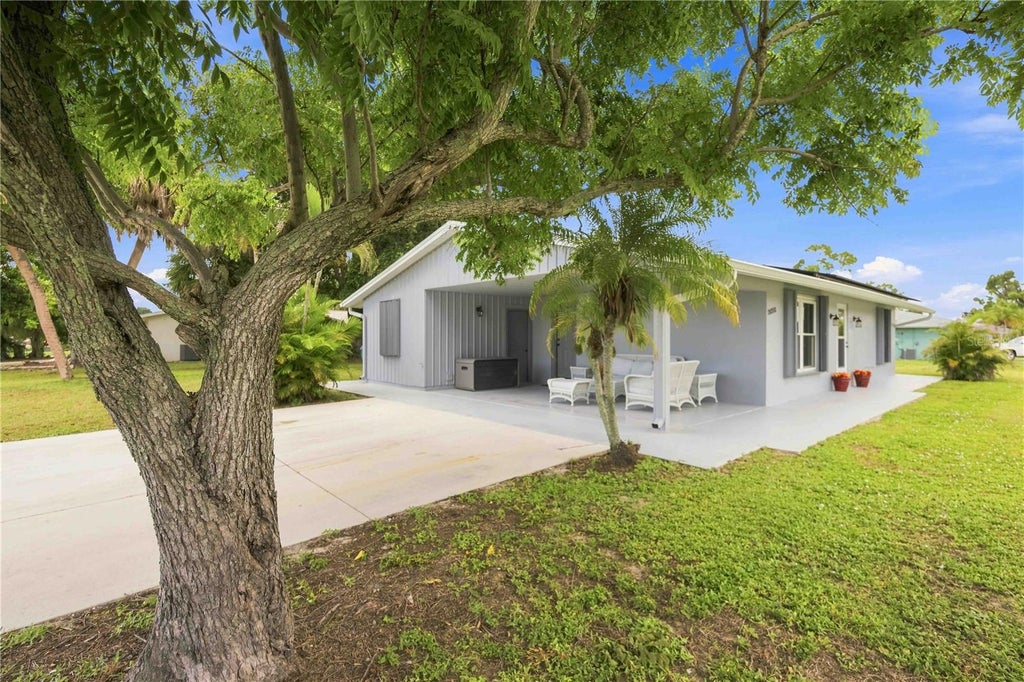 Photo of 21298 Midway Boulevard, Port Charlotte, FL 33952 (MLS # D6148486)