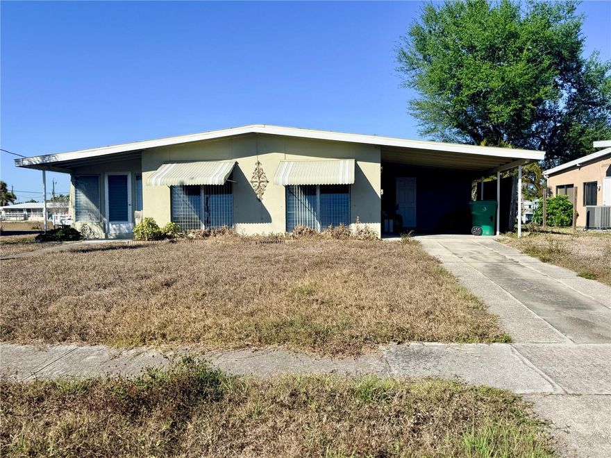 Great saltwater home just minutes to the harbor with one bridge access to open water. This three-bedroom, one-bath home features tile flooring throughout and a skylight in the kitchen for natural light. A spacious Florida room and screened lanai. An attached workshop and laundry room offers added functionality and storage. The home is connected to city water and sewer and is centrally located close to shopping, dining, and everyday conveniences.