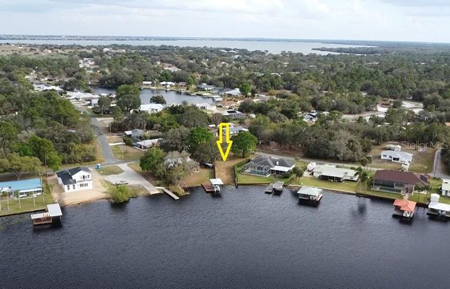 Lovely lakefront corner lot in upscale neighborhood (with no HOA) on gorgeous Lake Carrie, with easy access by boat to Lake June, Lake Henry, at least one restaurant, and miles of scenic canals without paying the stratospheric prices for property directly on Lake June, which is over 3700 acres with nearly six miles of beautiful shoreline. Irregular shape and configuration of the lot funnels the view and emphasizes the beauty of the lakefront, and a public ramp for launching and retrieving your boat is two doors away. These lakefront lots are becoming more rare and coveted by the day, and there aren't many left. Mature oaks with an open area in the center that will require little or no clearing to construct a magnificent home. This lot is priced to sell, and won't last. Build your lakefront dream home on an affordable lot on Lake Placid's most popular and desirable body(ies) of water -- while you still can! Facts, figures and illustrations are based on available information and may be approximate. Buyer is urged to independently confirm and to obtain an independent survey.