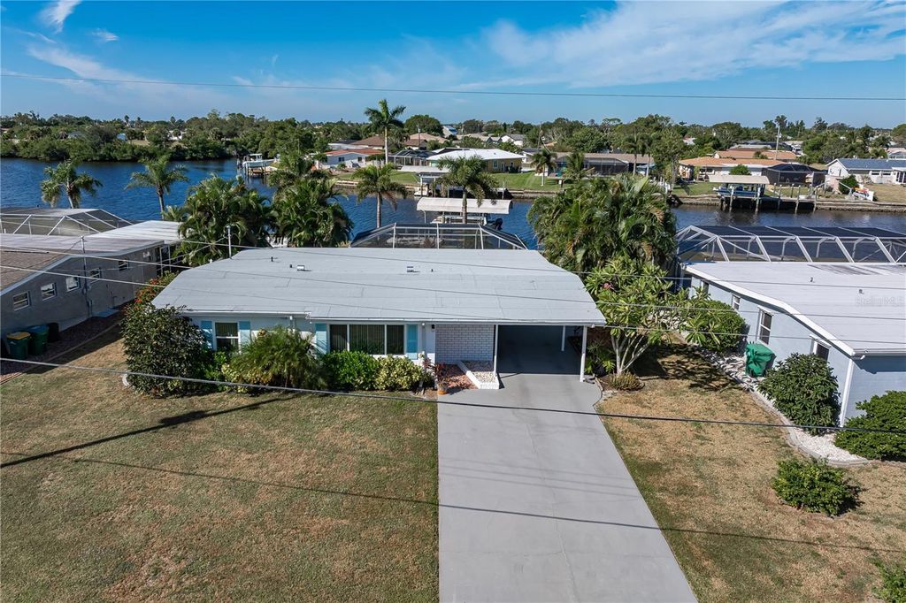 Photo of 407 Dunn Drive, Port Charlotte, FL 33952 (MLS # C7517373)