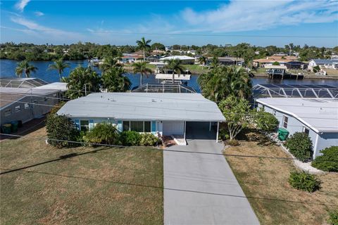 Photo of 407 Dunn Drive, Port Charlotte, FL 33952 (MLS # C7517373)