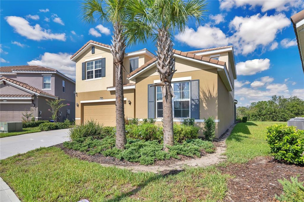Photo of 7699 Oakmoss Loop, Davenport, FL 33837 (MLS # O6384522)